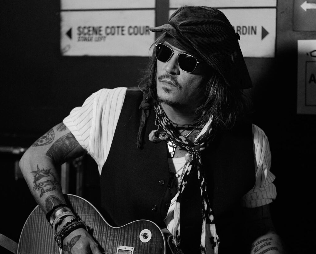 Johnny Depp playing guitar